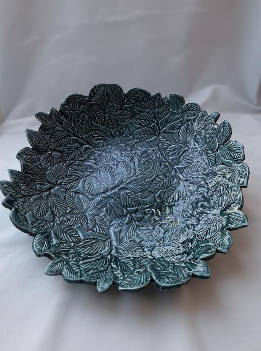 Sculptural ceramic piece with nature motif